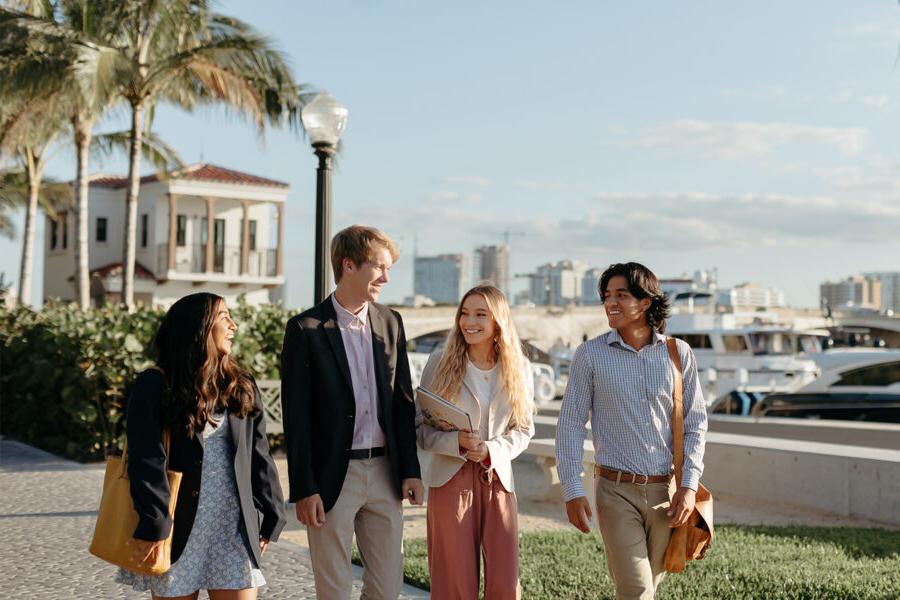 master of business administration mba students walk near the intercoastal waterway in 西<a href='http://teams.rupiahpasti.net'>推荐全球最大网赌正规平台欢迎您</a>.
